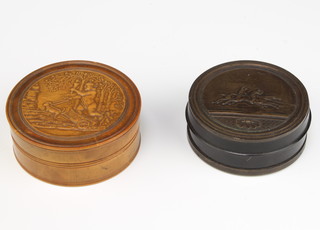A circular turned wooden "tortoiseshell" trinket box the lid decorated a classical scene with charioteer 2cm x 7cm and 1 other 3cm x 6cm 