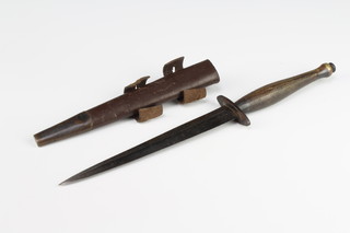 A second pattern Fairbairn Sykes fighting dagger with 16.5cm blade and leather scabbard, the crossbar marked B2 and with broad arrow mark  