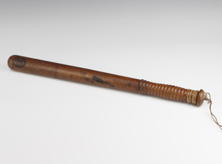 A Bank of England turned wood truncheon, the end marked Bank of England