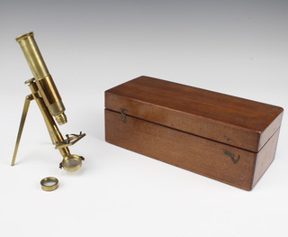 John Browning of 68 The Strand London, a students brass single pillar microscope marked 997 contained in a mahogany case 