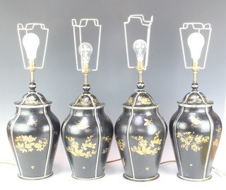 Two pairs of lacquered table lamps in the form of lidded urns decorated butterflies 41cm x 20cm 