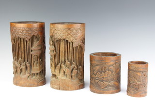 A pair of Japanese carved bamboo vases 25cm x 14cm x 12cm and 2 others 14cm x 7cm and 12cm x 7cm 