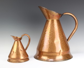 A planished copper harvest measure 41cm x 31cm diam and 1 other 19cm x 17cm (some dents) 