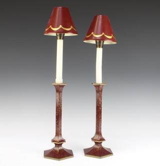 A pair of Regency style hexagonal red lacquered candlesticks with metal shades 28cm x 11cm x 12cm 