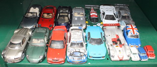 Thirteen Maisto model cars and four models of minis 