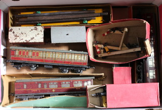 A Hornby O gauge no.1 side tipping wagon boxed, ditto no.2 lumber wagon boxed, 3 carriages etc 