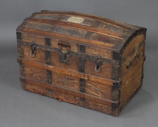 A Victorian fibre and wooden  bound domed cabin trunk with metal banding 58cm h x 81cm w x 48cm d 
