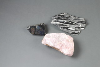 A large section of sculptural stone 36cm h x 31cm w, a large section of "quartz" 11cm x 29cm x 18cm and 1 other polished stone specimen 13cm x 18cm x 10cm  