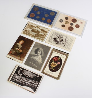Two Elizabeth II proof coin sets 1966 and 1967 together with a collection of postcards Arundel and Sussex 