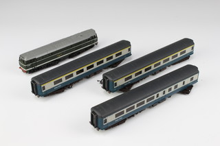 An Airfix OO gauge double headed diesel locomotive and 3 Airfix carriages 