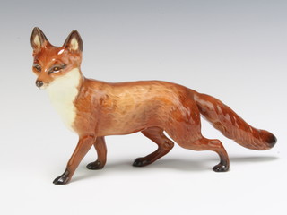 A Beswick figure fox standing, gloss, 1016A by Arthur Greddington 14cm 
