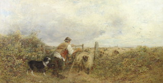 William Gosling (1824-1883), oil on canvas signed, a shepherd and sheep dog letting sheep through a country gate 44cm x 84cm 