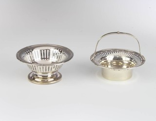 A pierced silver basket 9cm Birmingham 1912 and a pedestal bowl 125 grams 