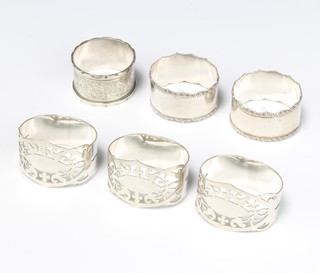 A set of 3 silver serviette rings Birmingham 1946 and 3 others, 158 grams