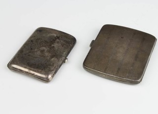 A silver engine turned cigarette case Birmingham 1925, a smaller plain ditto 163 grams 