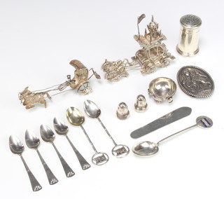 A circular silver pepper London 1944, a silver buckle and minor silver items, weighable silver 310 grams 