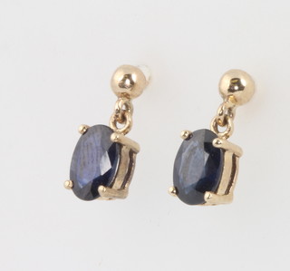 A pair of yellow gold sapphire ear drops 15mm 