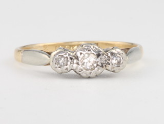 An 18ct yellow gold 3 stone diamond ring 1.8 grams, size L 