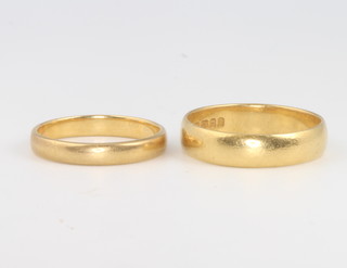 Two 22ct yellow gold wedding bands size K 1/2 and O 1/2 6.9 grams