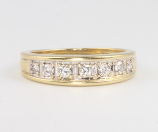An 18ct yellow gold 7 stone diamond ring 4.9 grams size O 