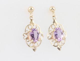 A pair of 9ct yellow gold amethyst ear drops 