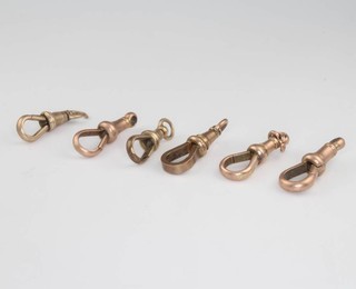 Six 9ct yellow gold clasps 10.1 grams