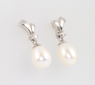 A pair of 18ct white gold diamond and cultured pearl ear drops 23mm 