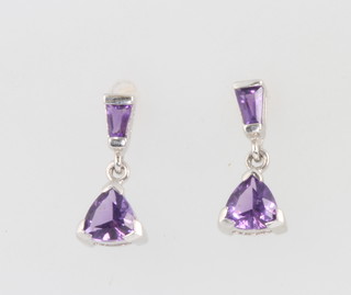 A pair of 9ct white gold tapered and pear cut amethyst ear drops 15mm 