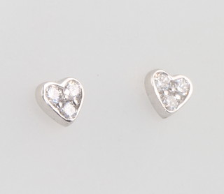 A pair of 9ct white gold diamond set heart shaped ear studs 5mm 