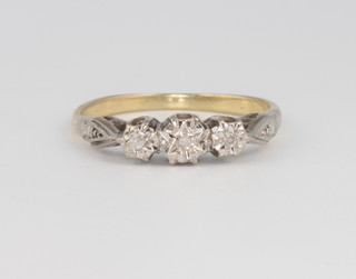 An 18ct yellow gold 3 stone diamond ring 2.5 grams size K 
