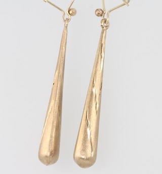 A pair of 9ct yellow gold tapered earrings 1.5 grams 