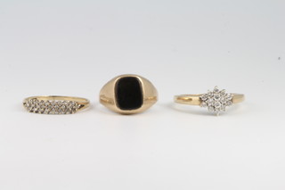 A gentleman's 9ct yellow gold black onyx signet ring size L, 2 gem set rings size M 