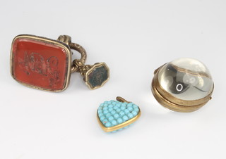 A 19th Century Cornelian seal, 1 other, a locket and brass ditto 