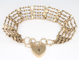 A 9ct yellow gold gate  bracelet with padlock 12.5 grams 