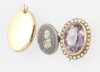A Victorian yellow gold amethyst and seed pearl brooch 35mm, a gold locket and a silver pin badge 