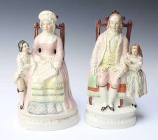 A pair of Victorian Staffordshire figures - Grandpa's Joy and Grandma's Hope 26cm 