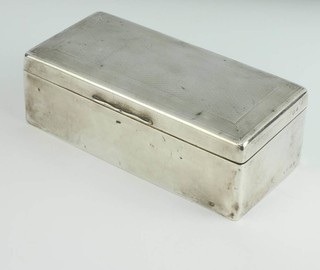A rectangular silver engine turned cigarette case Birmingham 1939 18.5cm 