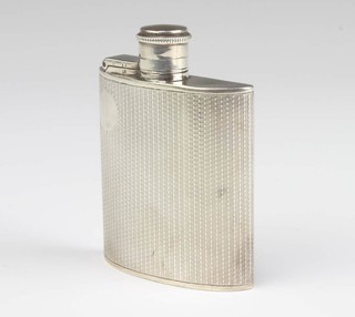 A silver engine turned hip flask Birmingham 1949, 9cm, 73 grams 