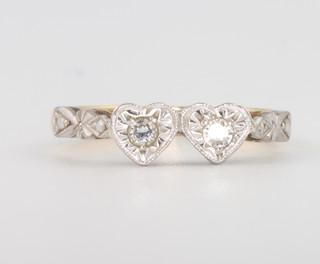 An 18ct yellow gold heart set diamond ring size K 1/2, 2.7grams