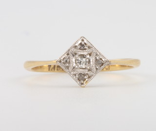 An 18ct yellow gold diamond shaped diamond ring 1.5 grams, size J 1/2