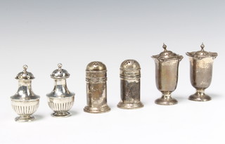 A pair of cylindrical silver condiments Birmingham 1924, 2 others pairs of condiments 176 grams