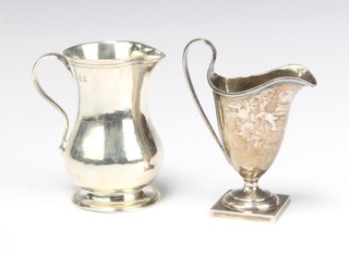 A Queen Anne style silver cream jug London 1924, a Georgian style ditto 229 grams