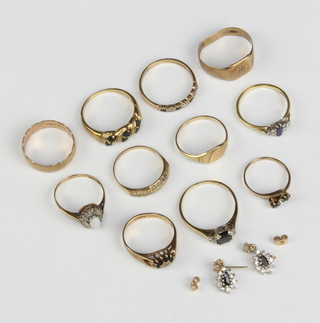 An 18ct yellow gold stone set ring, ten 9ct rings and a pair of earrings, gross 22 grams 