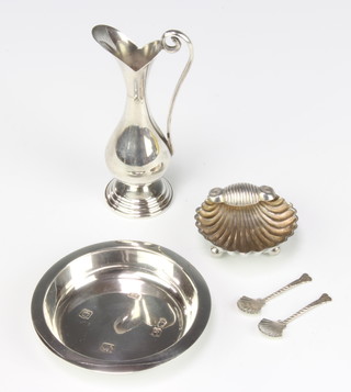 A circular silver dish Sheffield 1939, a Sterling vase,  a shell salt and 2 spoons, 68 grams