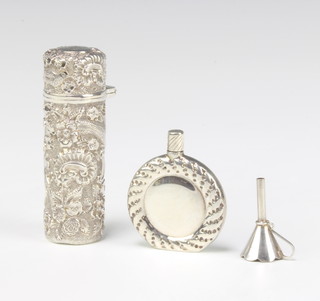 A Victorian repousse silver cylindrical scent London 1892 7cm, a modern scent and funnel 