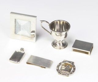 A Tiffany christening cup London 1973, 4 other Tiffany items and a Cartier money clip 