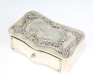 A Victorian serpentine repousse silver box with drawer, decorated with peacocks in a garden landscape London 1898, maker William Comyns 16cm 