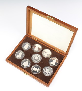 A set of 9 silver commemorative coins from the Birmingham Mint "The Queens of the British Isles" 405 grams 
