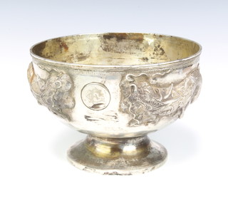 A Chinese repousse silver punch bowl decorated dragons with inscription and monogram, 770gms 21cm diam