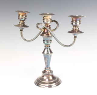 A silver plated 3 light candlestick 27cm 